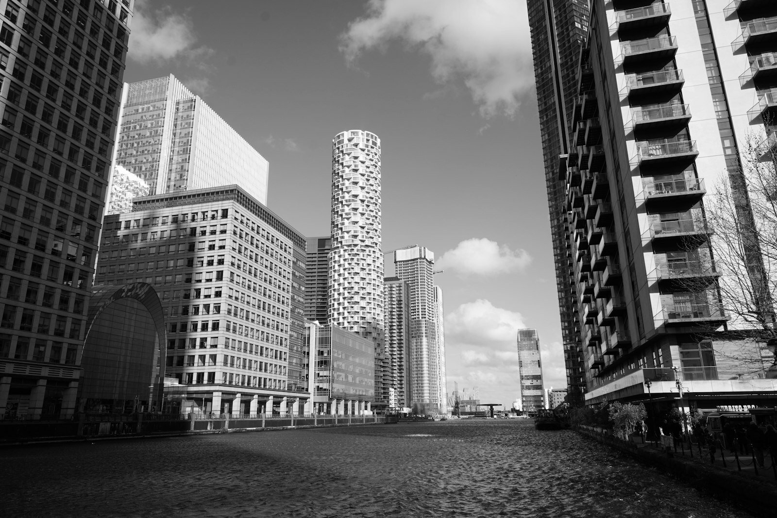 A river running through a city with tall buildings