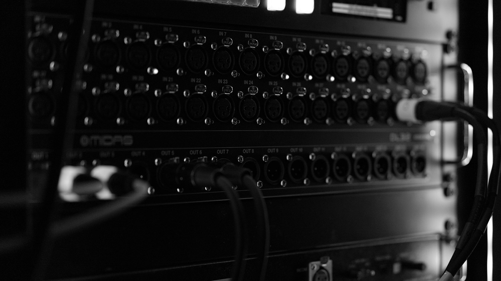 a close up of a computer with green lights